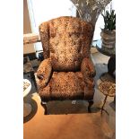 Chair Gotic Berjer a take on the classic wing back arm chair upholstered in a brown leopard