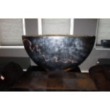 Oval Bowl flaunts a distinctive and large boat shape, and Mashura dark silverleaf with mother of