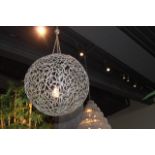 Hanging Lamp Globe Y textural sculpture piece is structured in flawless high-quality nickel brass,
