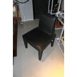 Dining Chair hand crafted in upholstered black cow leather, a modern and stylish item, ideal for