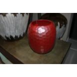 Glass Vase Ruby is medium sized and enhanced with wraparound faceted detailing. The opulent vase