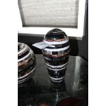 Box Stripes Tall ornamental conical vessel embellished with contrasting black, brown, shell and
