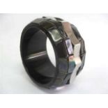 Bracelet black rainbow shell and stainless steel polished, adornment squares. Exquisitely