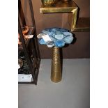 Bar table Rotate a polished blue agate round table with brass base within the top you see the colour