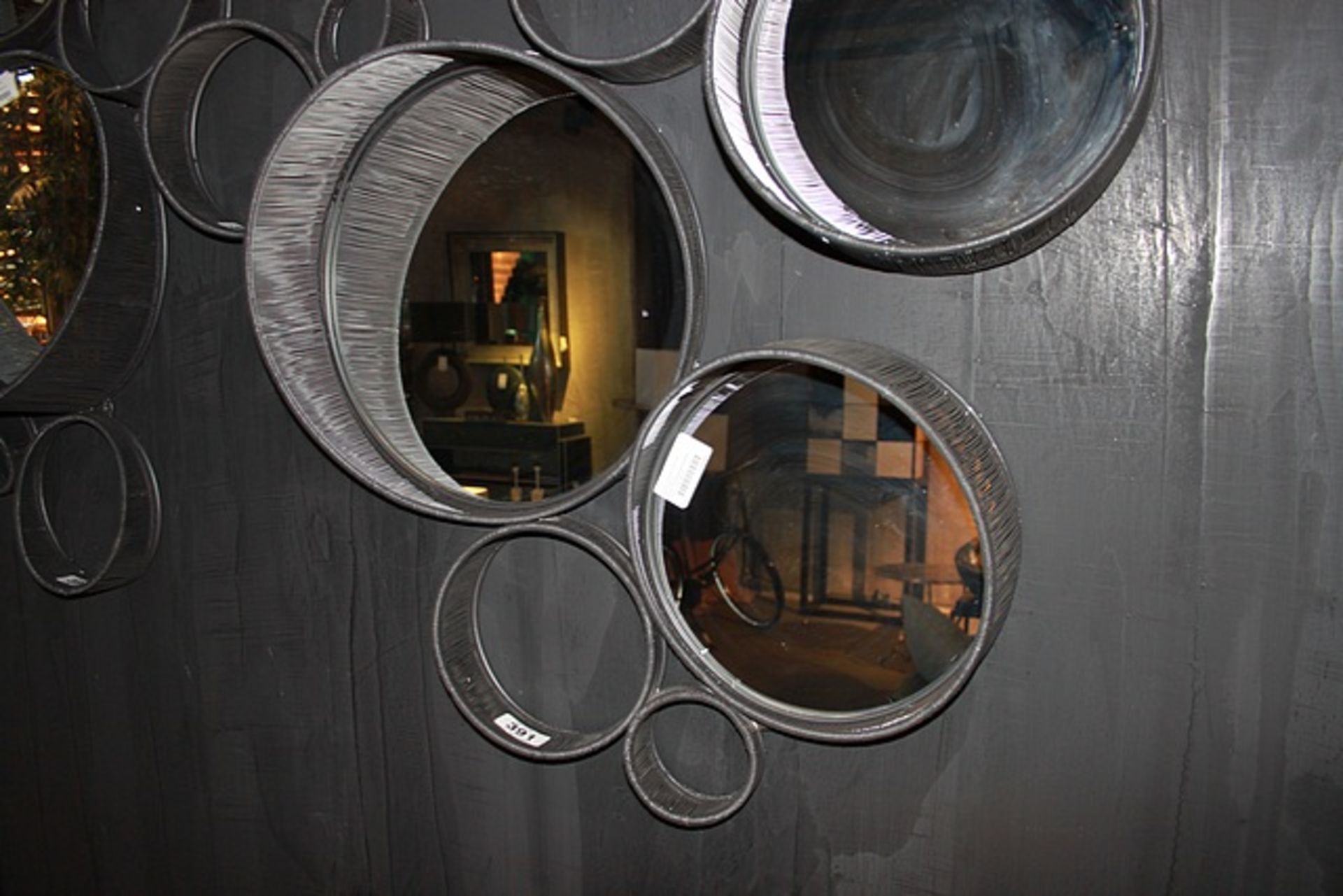 Mirror Cover a contemporary wall mirror in fine iron wire and powder coated anthracite frame