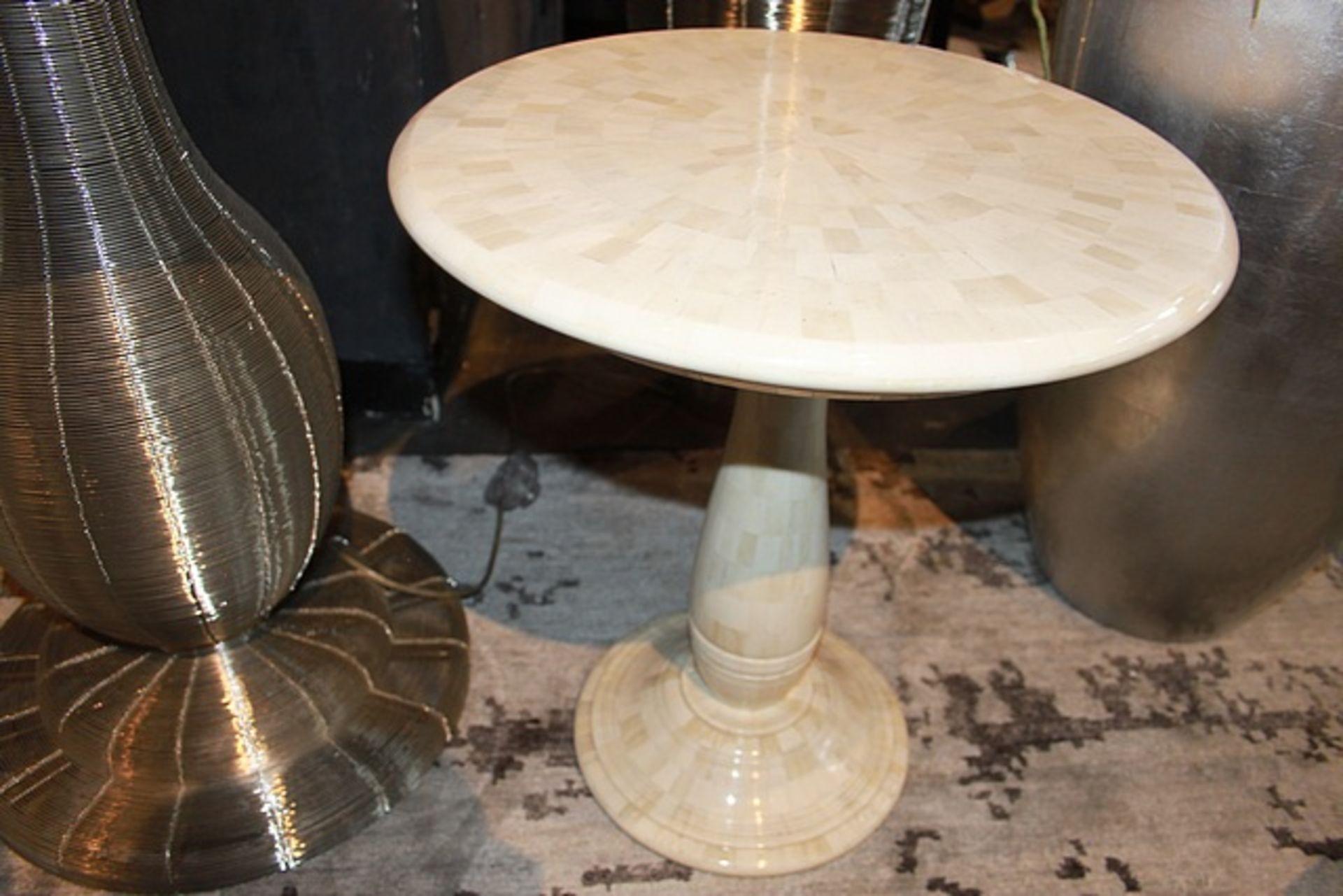 Side Table Alano a real statement piece constructed in polished white buffalo bone being a porous