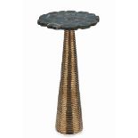 Bar table Rotate a polished blue agate round table with brass base within the top you see the colour