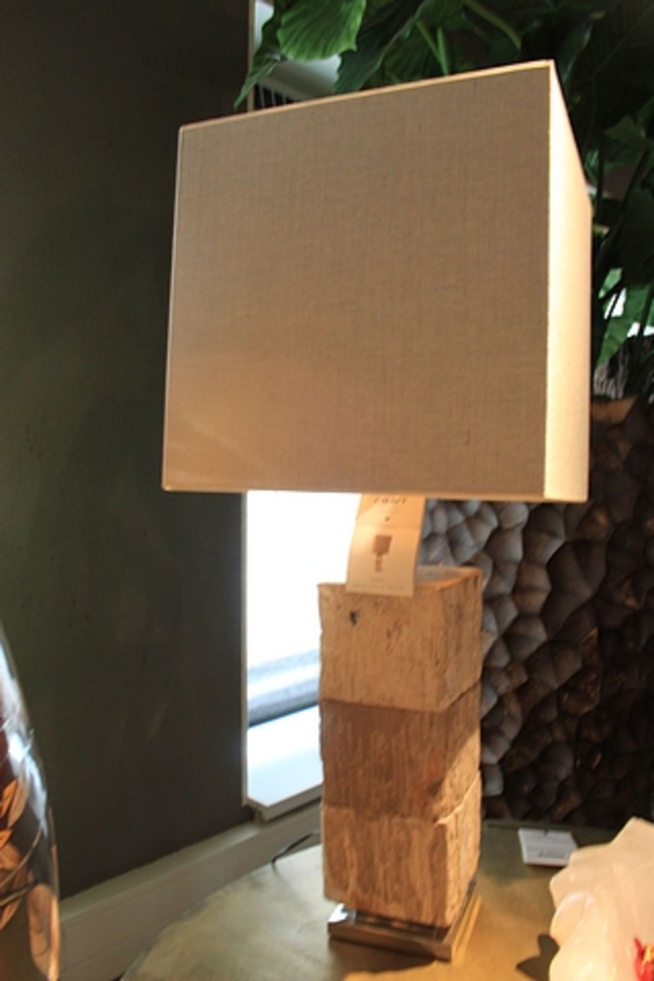 Table Lamp Flores hand crafted from blocks of natural petrified wood this modern table lamp can