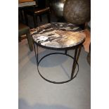 Side Table Rondo mixed medium retro round table with striking black and white petrified wood top, on