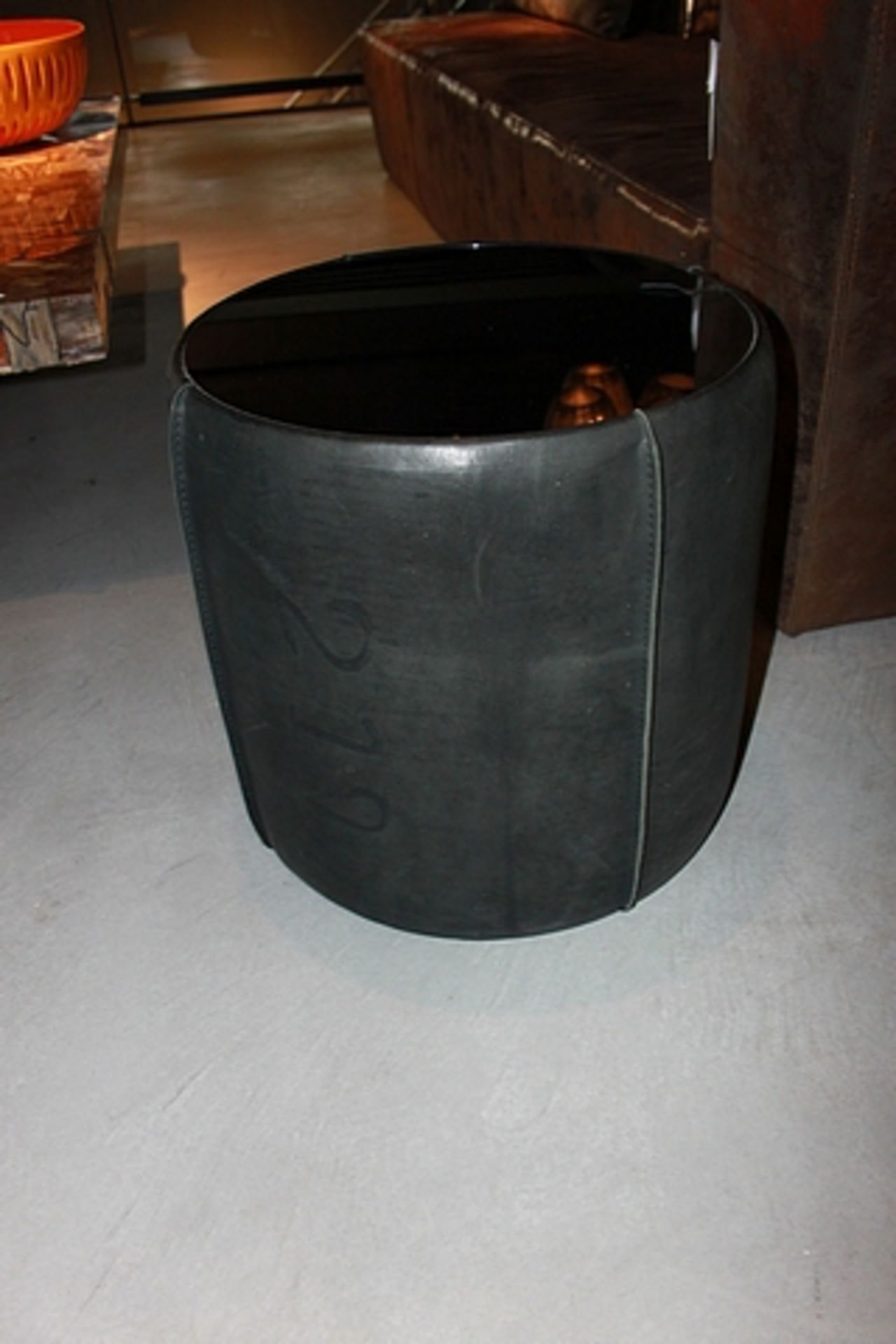 Coffee Table boasting an upholstered Pion black cow leather chunky cylindrical base, and classic