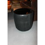 Coffee Table boasting an upholstered Pion black cow leather chunky cylindrical base, and classic