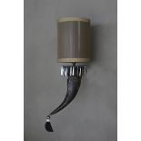 Wall lamp horn arise. Simply stunning, a piece which will only enhance the glow from the light,