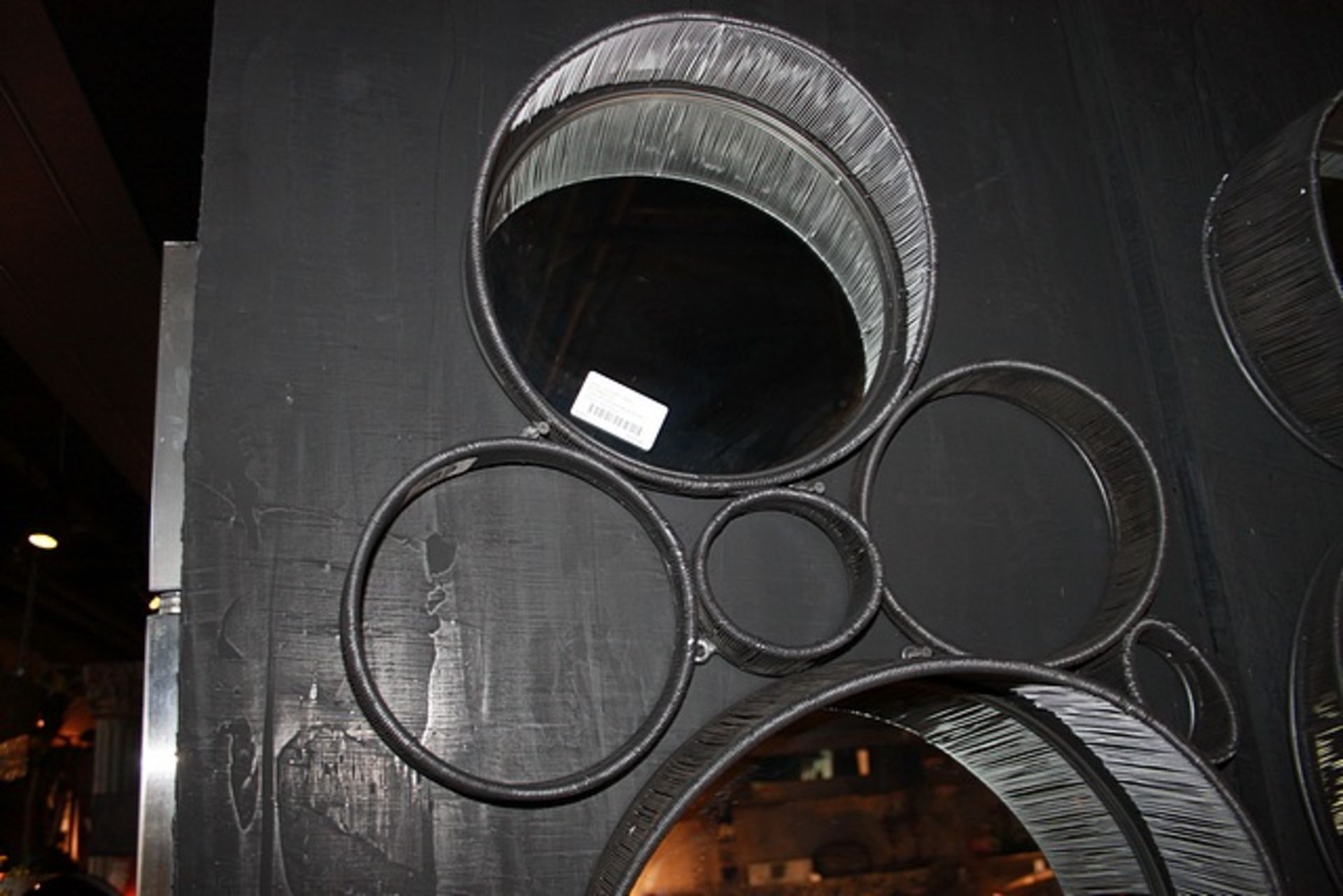 Mirror Cover a contemporary wall mirror in fine iron wire and powder coated anthracite frame