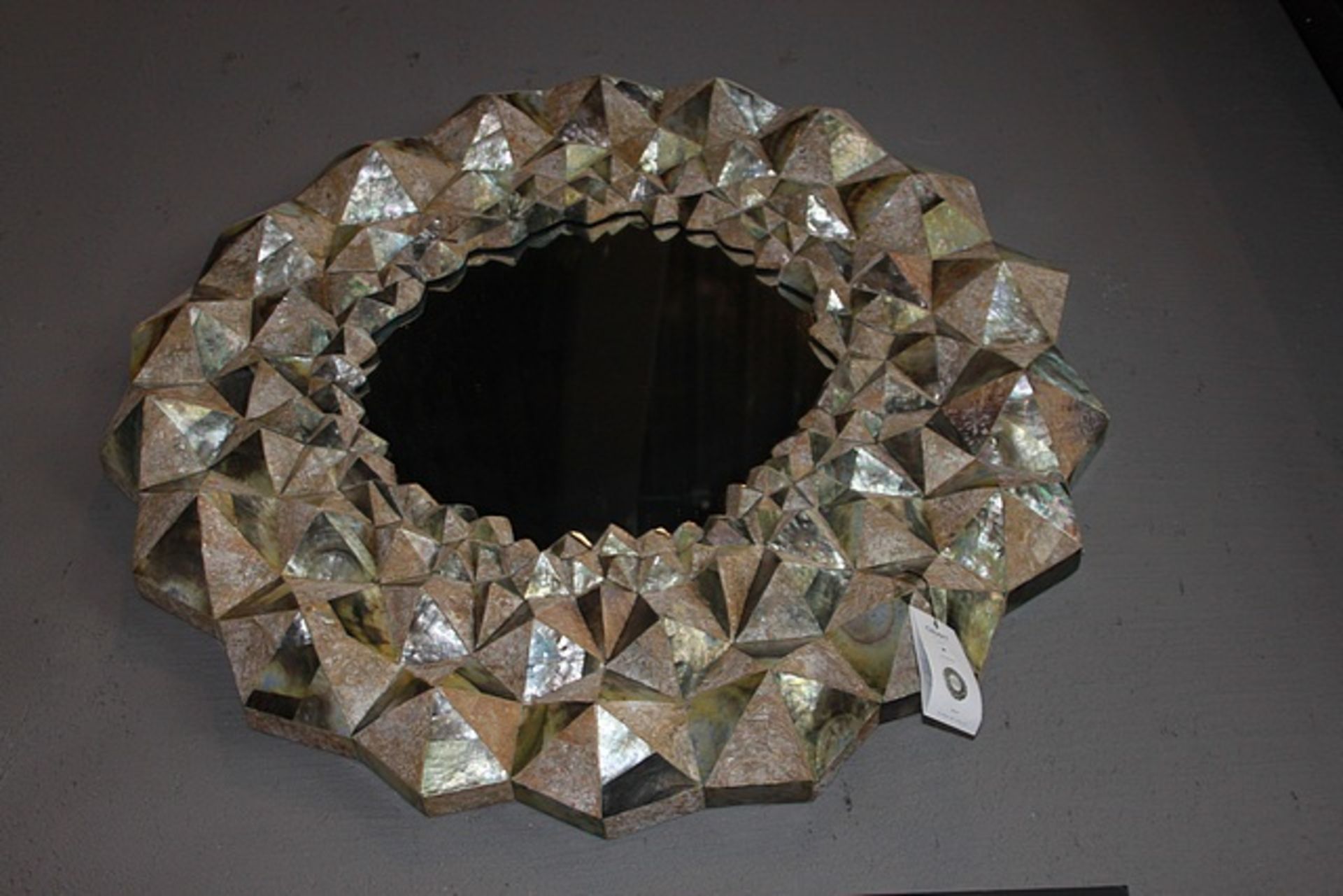 Mirror Cave earthy tones and the amalgamation of the variations of textures within this mirror,