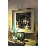 Vulgan Mirror this square wall mirror channels an exotic attitude with a sleek clean lined