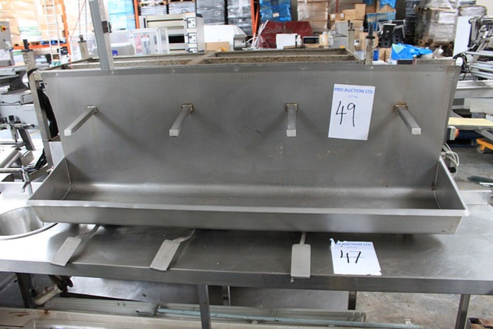 Stainless steel 4 station knee operated sink