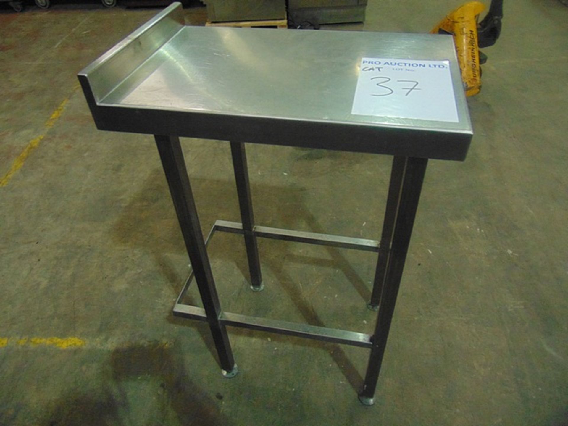 Stainless steel table with back splash 380mm x 600mm x 950mm