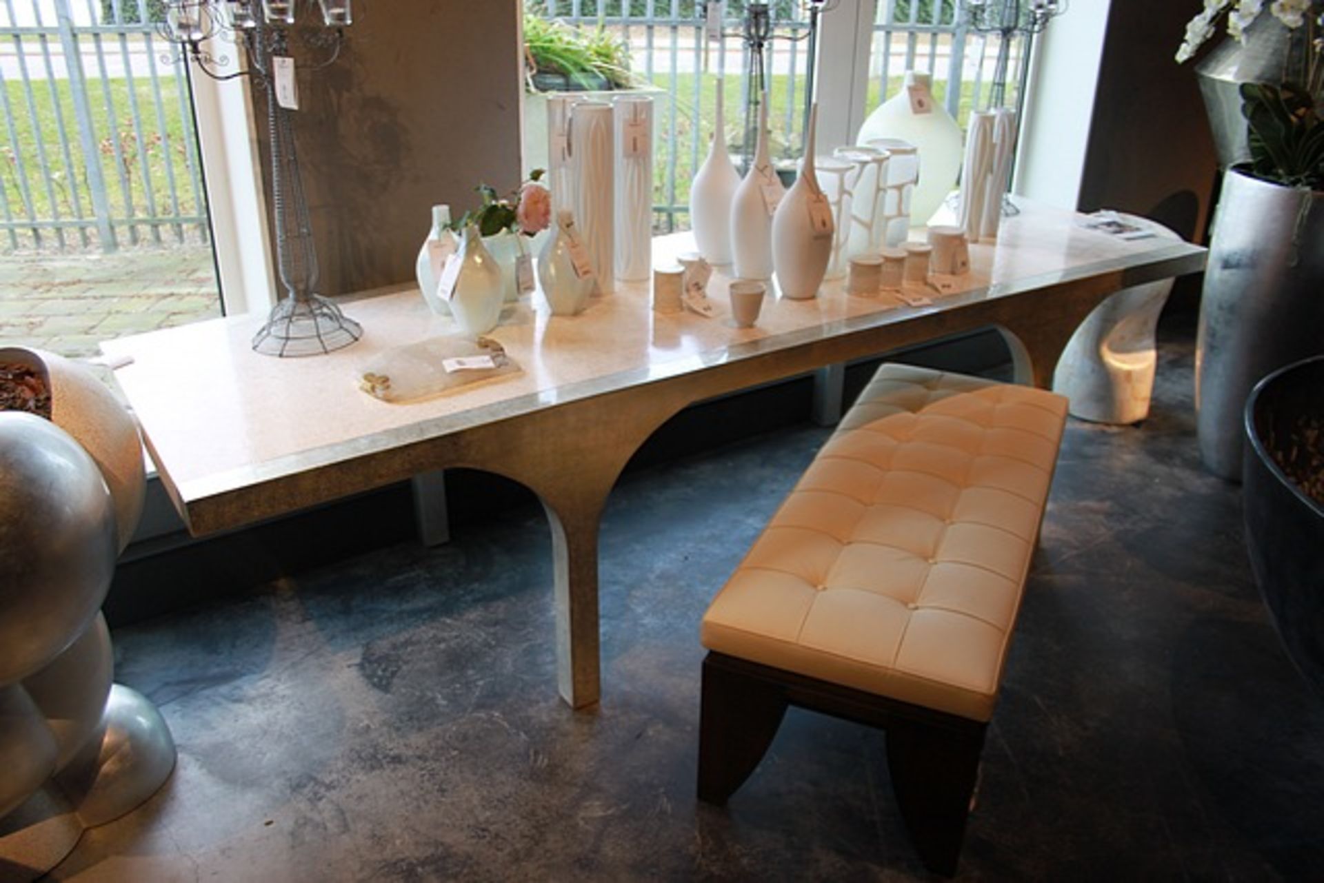 Arc large dining table the eggshell is inlaid into one of nature’s most durable products: lacquer.