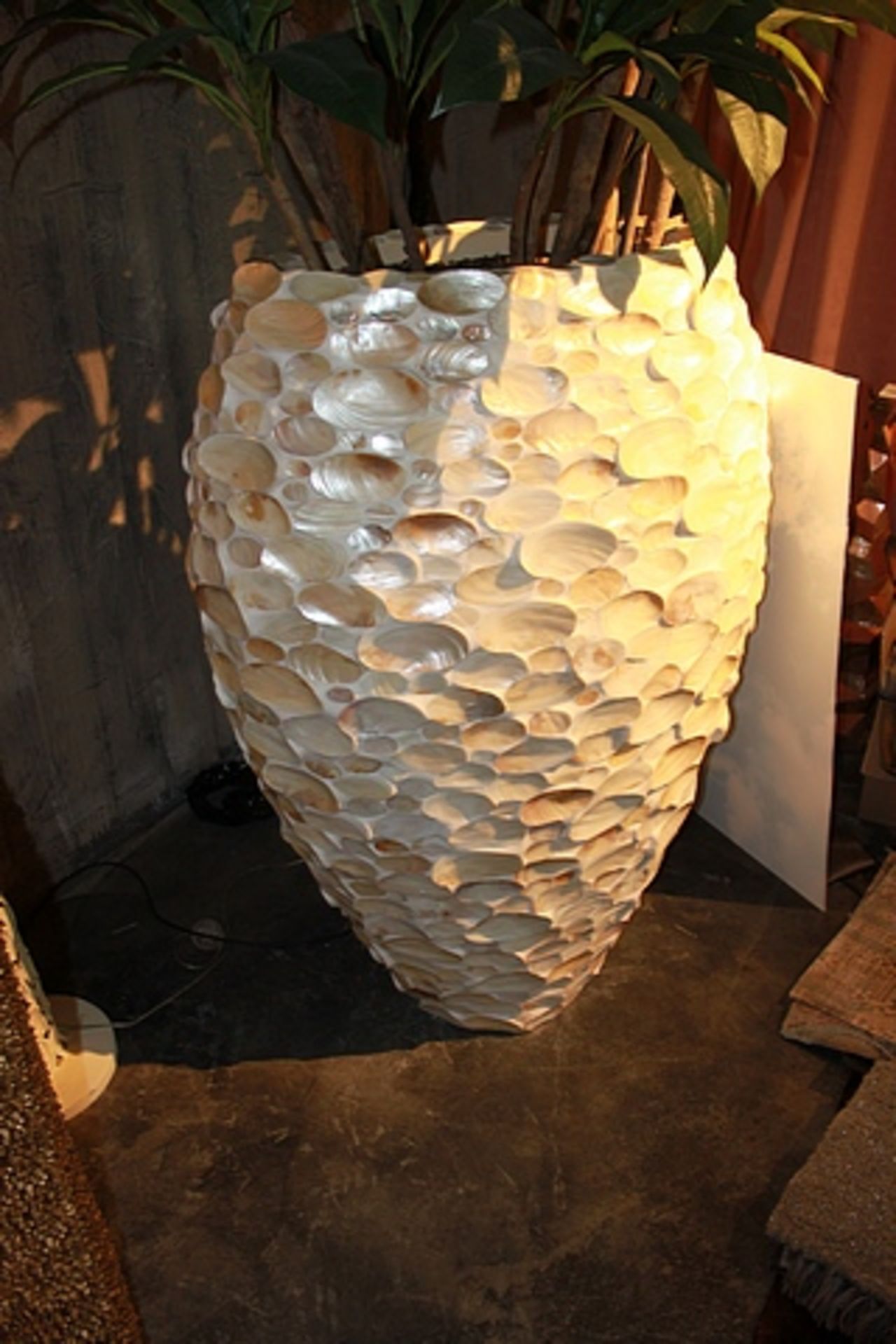 Vase Oval Kabibe the white shell is heat moulded into a lovely accent stool the piece is faceted and