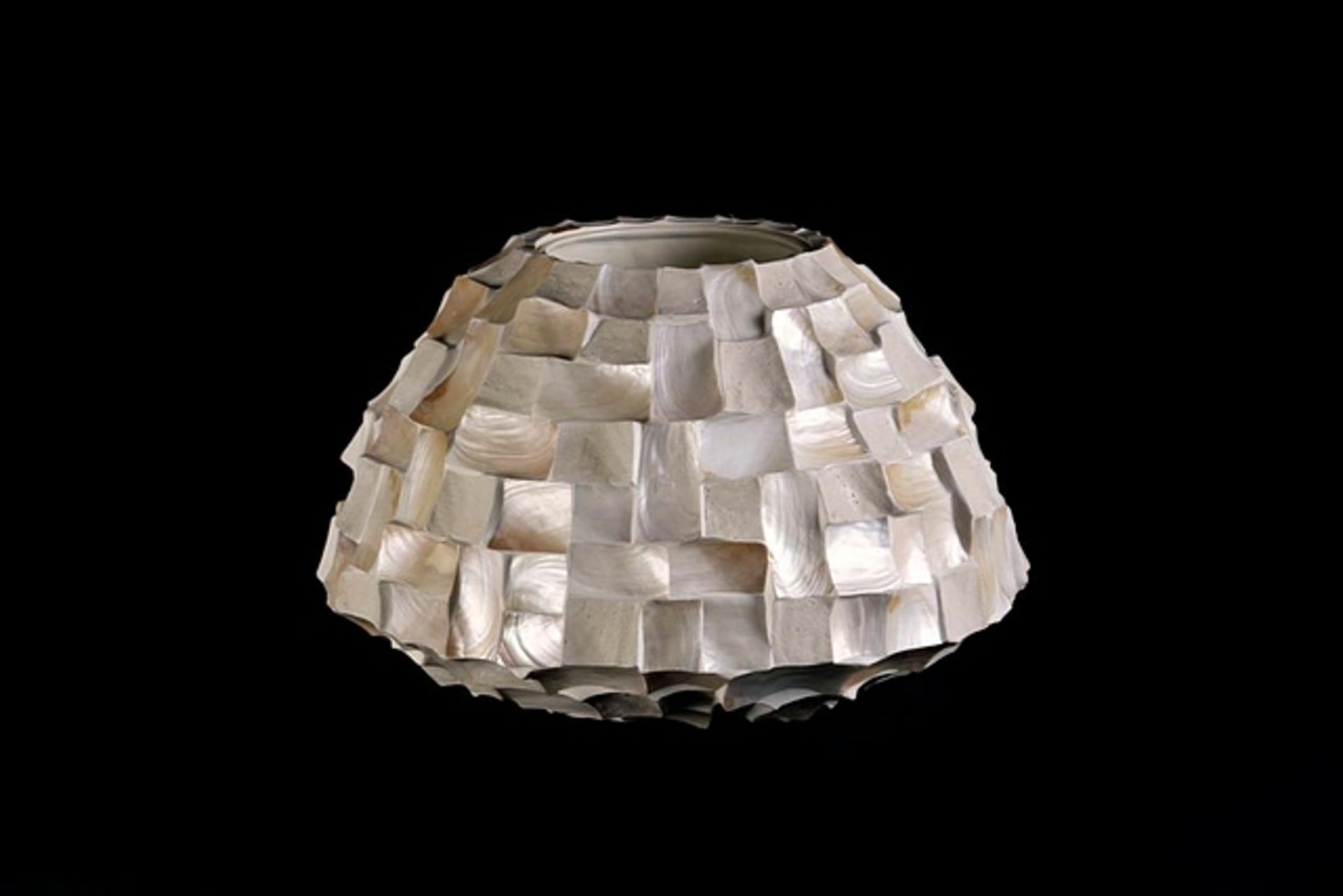Bowl radica white kabibe shell glow. This is a stunning piece and a real focal point for the room.