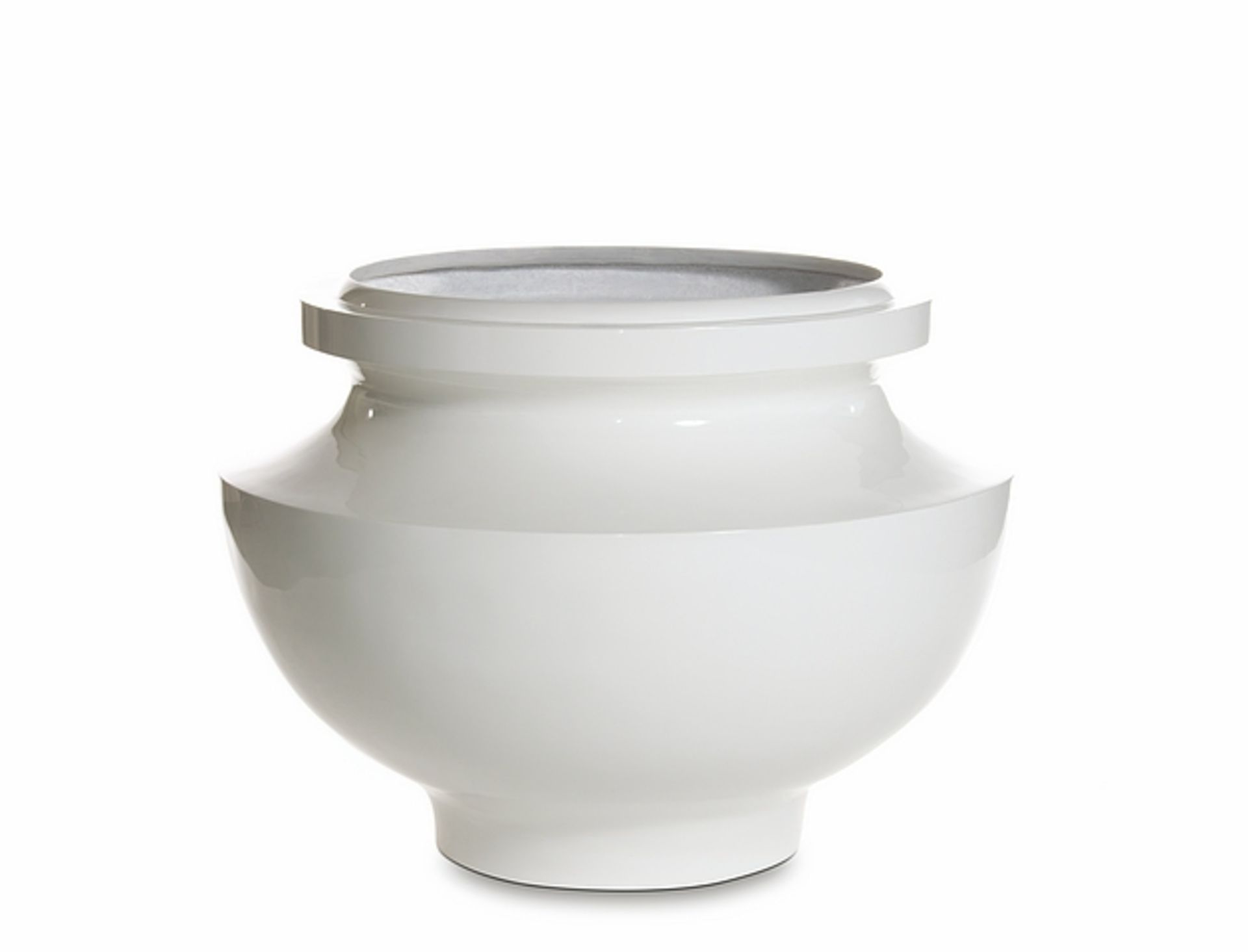 Baroque planter low white laquer low. A sculptured piece captured in a heavenly white form,