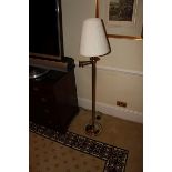 Contemporary silver metal adjustable swing arm floor lamp the angle of the lamp can be moved and