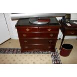 A Georgian style mahogany chest of drawers with three full and two half drawers on bracket plinth