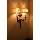 A pair of Georgian styled twin arm wall sconces