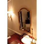 A Venetian arch shaped gilt colour framed wall mirror 900mm x 580mm