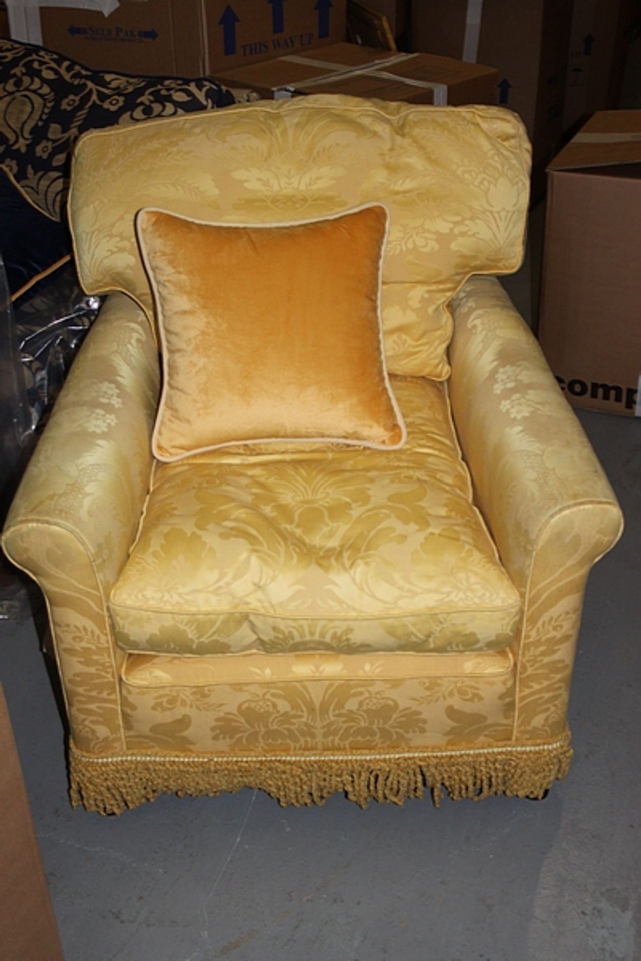 Armchair upholstered in a gold broccade fabric solid leg 700 x 800mm