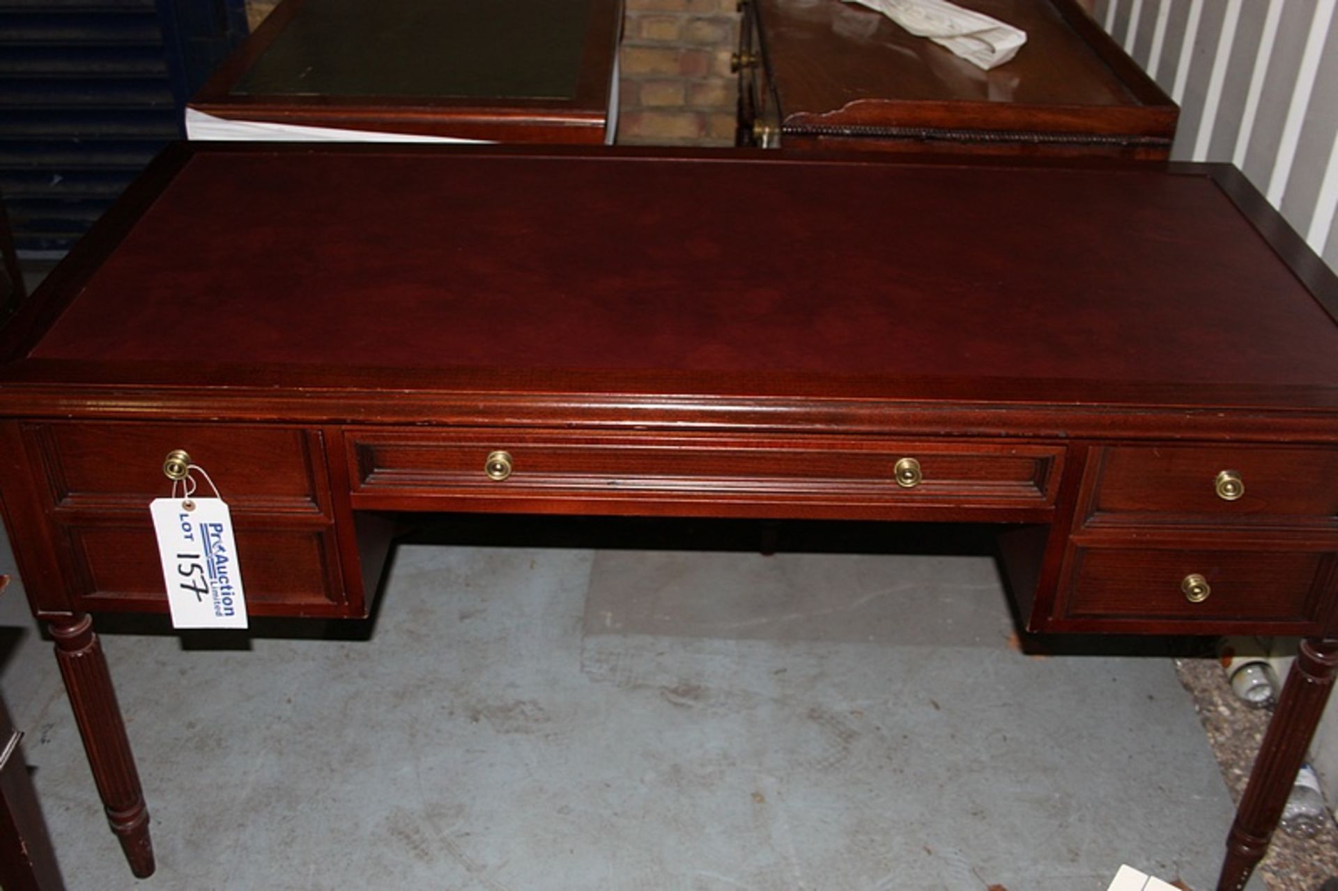 A Georgian style mahogany writing desk the moulded top above a frieze centre drawer flanked - Image 2 of 2