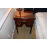A pair Georgian style bedside cabinets a single drawer below the moulded top with two smaller