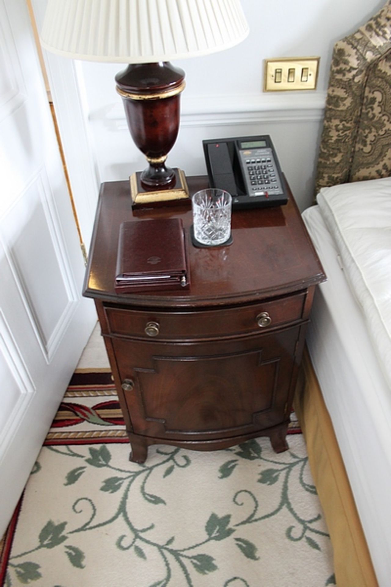 A pair of Georgian style bow fronted bedside cabinets with single drawer and cupboard under 500mm