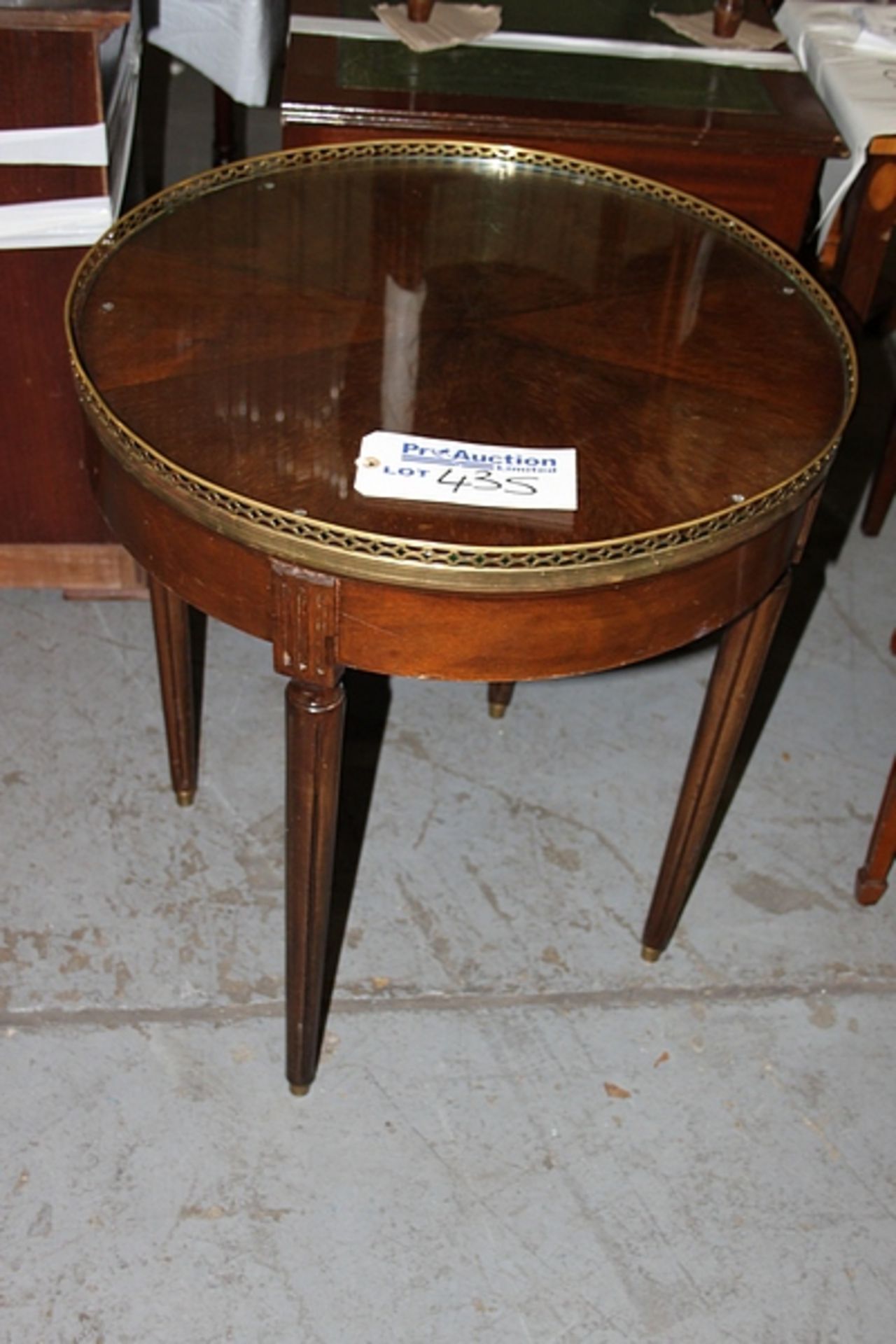 A mahogany occassional table