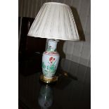 A pair of ceramic floral pattern table lamps