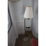 Contemporary silver metal adjustable swing arm floor lamp the angle of the lamp can be moved and