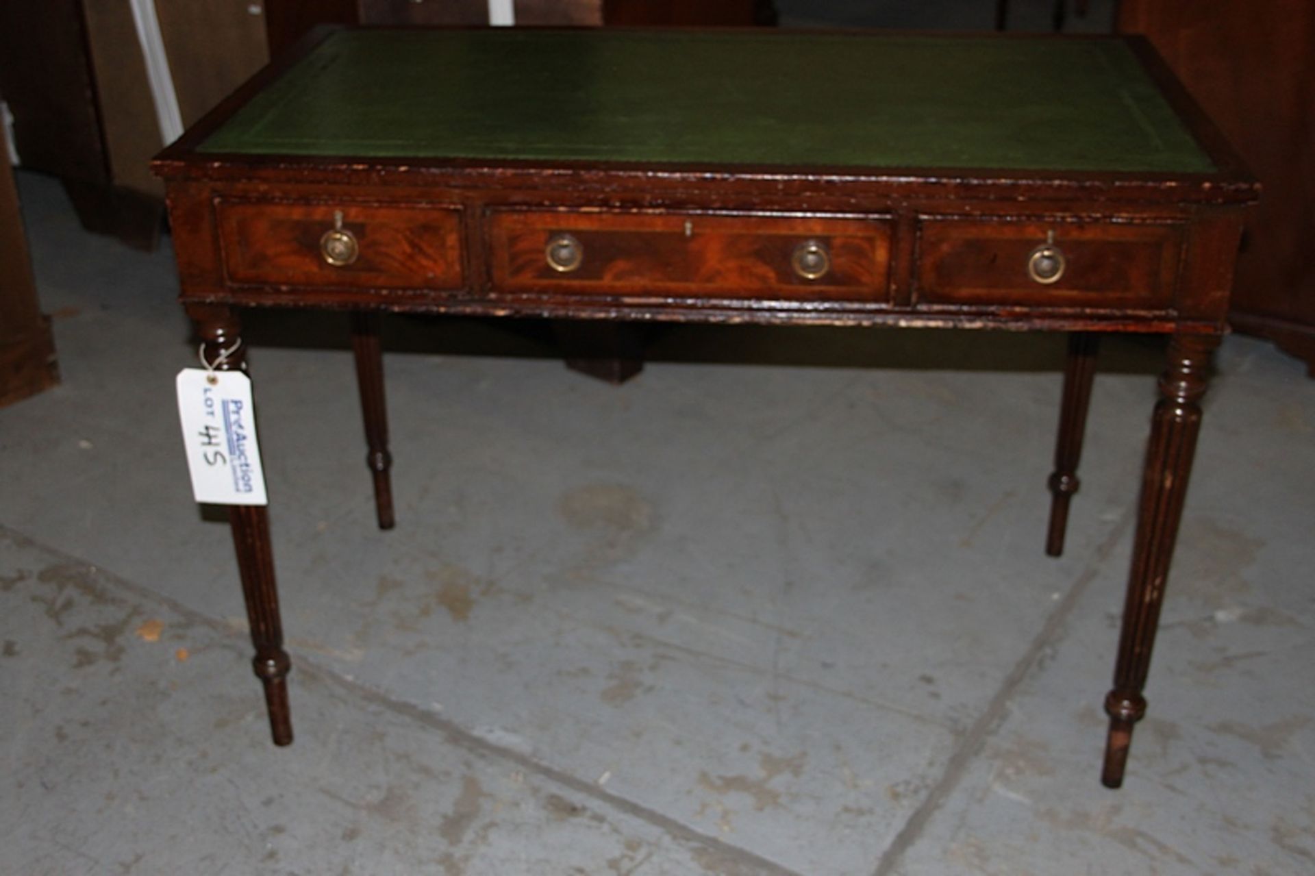 A Georgian style mahogany three drawer writing desk the top with tooled leather inlay mounted on - Image 2 of 2