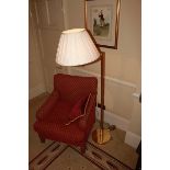 A swan neck floor standing lamp finished in brass 1680mm
