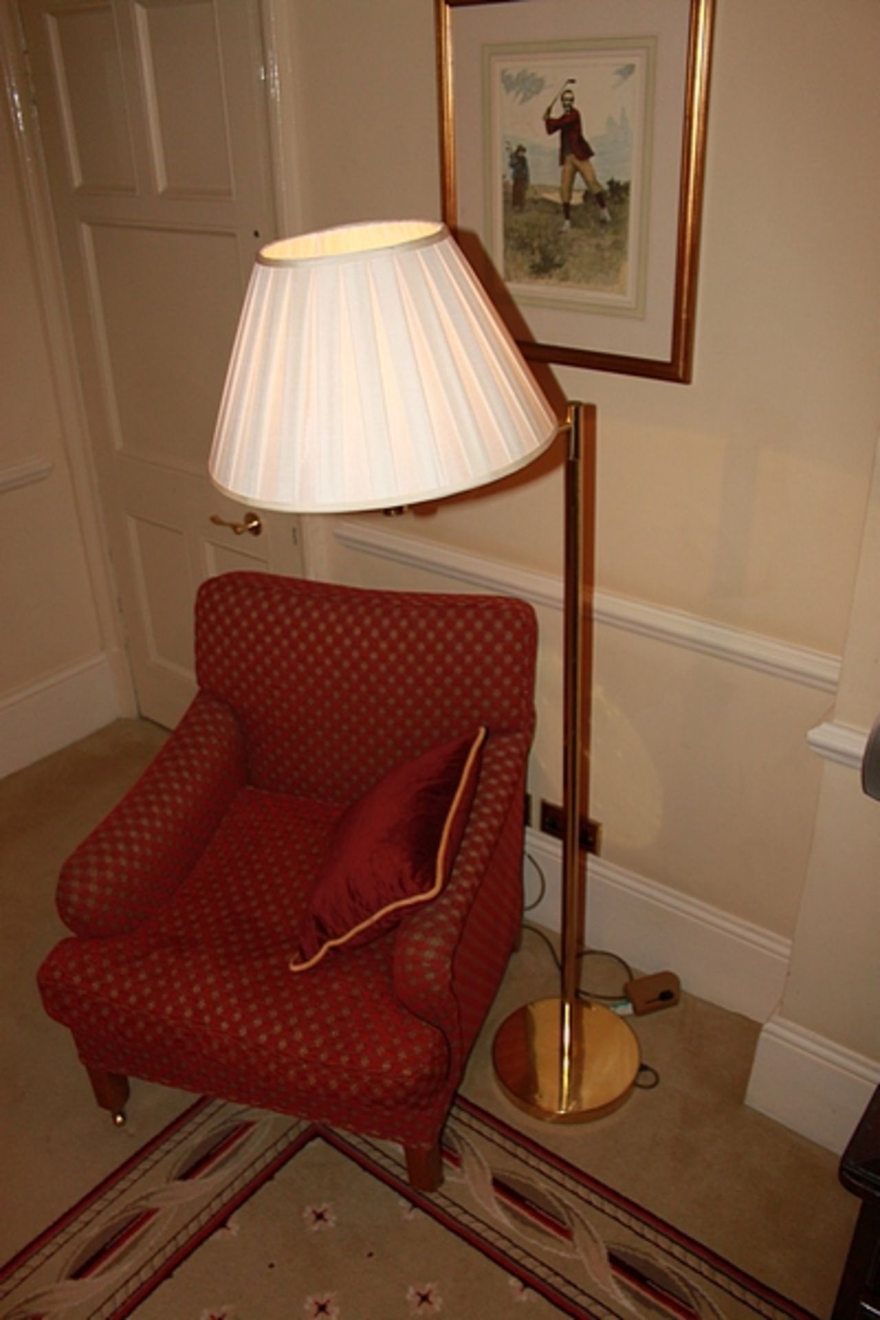 A swan neck floor standing lamp finished in brass 1680mm