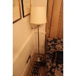 Contemporary silver metal adjustable swing arm floor lamp the angle of the lamp can be moved and