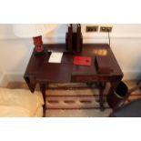 A Georgian style two drawer tooled leather top inlay writing table with stretcher 920mm x 560mm