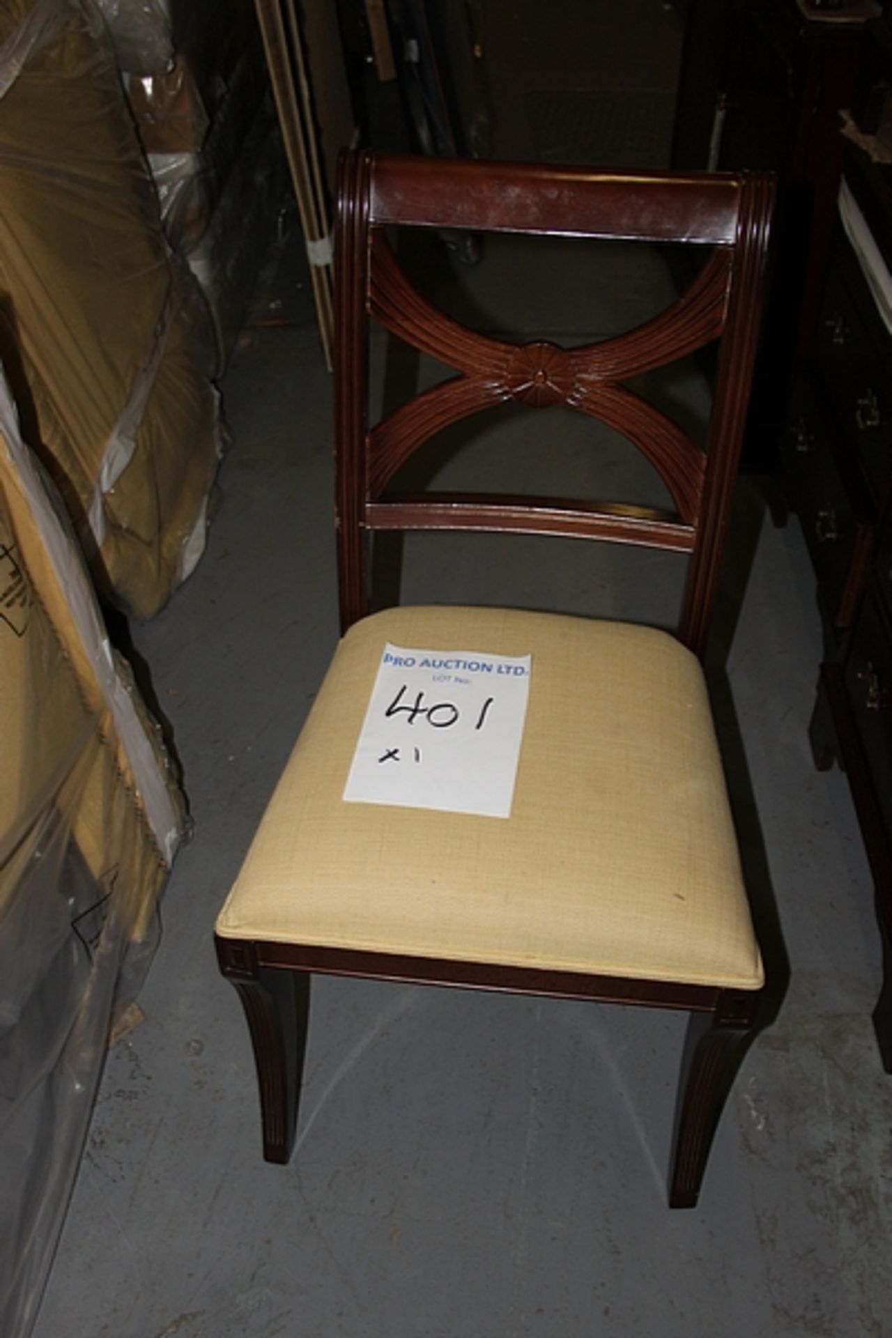A mahogany cross back Georgian style side chair with gold cream seat pad