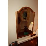 A Venetian arch shaped gilt colour framed wall mirror 900mm x 580mm