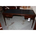 A mahogany free standing inlay writing desk kneehole with two graduated drawers to each side mounted