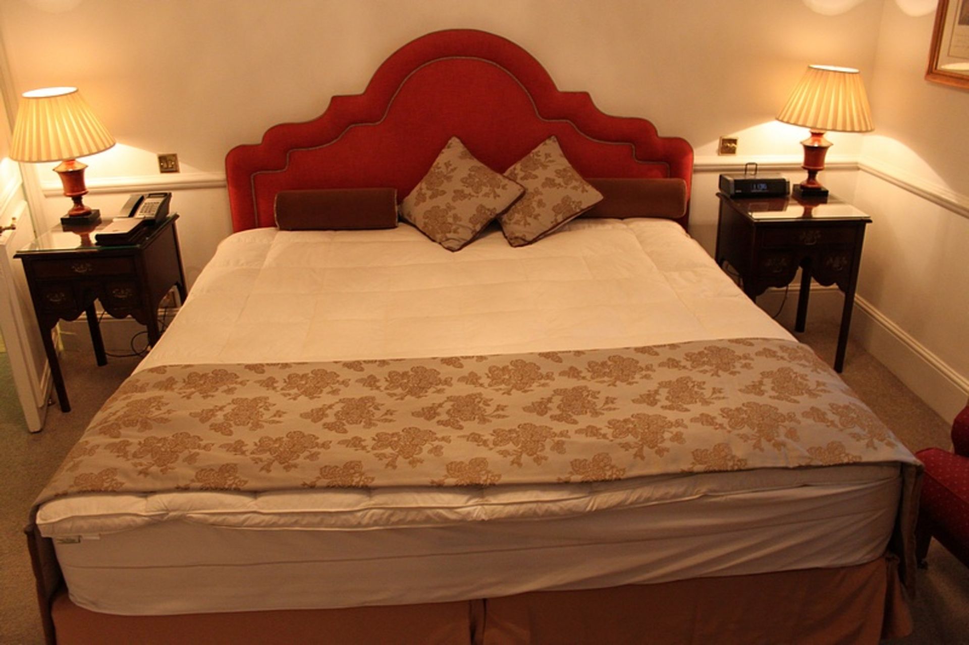 Hospitality Simmons Bedding Company base, mattress and large red domed headboard complete with