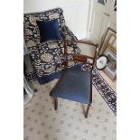 A mahogany side chair with a blue pad seat turned top rail on backrest