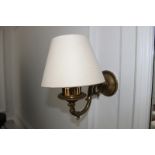 A pair of Georgian styled brass wall sconces