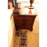 A pair of mahogany bedside cabinet chests in the Georgian style three drawers below, of dovetail