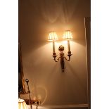 A pair of Georgian styled twin arm wall sconces