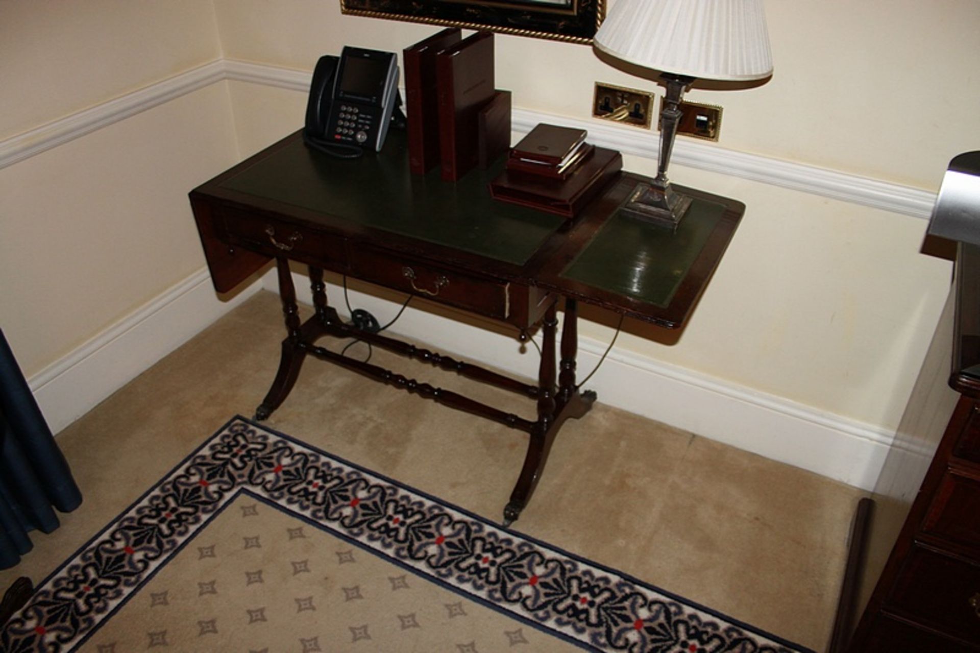 A Georgian style mahogany sofa writing table central frieze below inlaid leather top and drop down